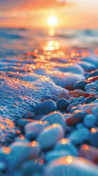 A close up of a sunset over the ocean with pebbles