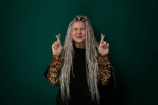 A woman with long hair is wearing a stylish leopard print jacket. She exudes confidence and style as she walks down the street. Her hair flows gracefully behind her as she moves with purpose and determination.