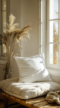 Warm sunlight bathes a tranquil nook, featuring a comfy cushion and decorative pampas grass, ideal for branding mockups