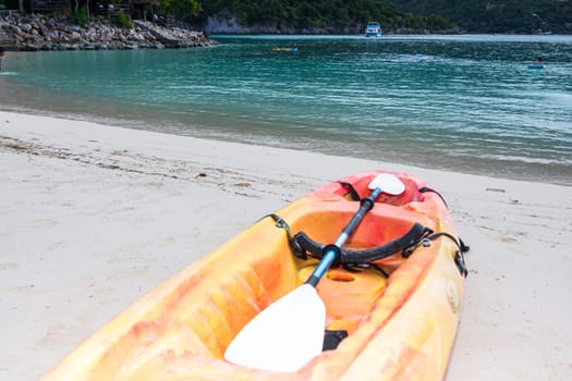 Active rest, sport, kayak. Canoe on a sandy beach