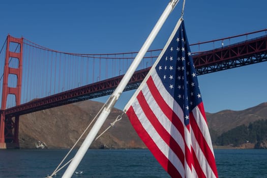 US Flag and Golden Gate Bridge from a boat tour