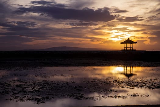 Sunrise in Bali with a Balinese Pavilion