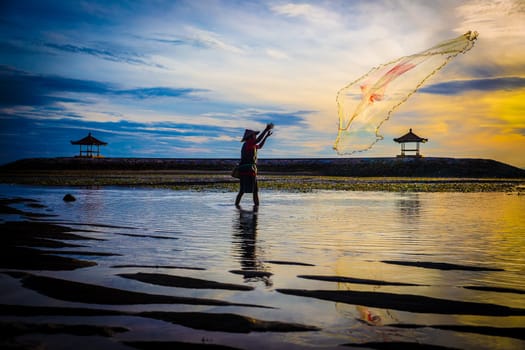 Bali fisherman at sunrise