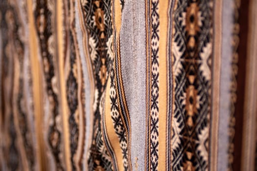 Brown, tan and black textile carpet