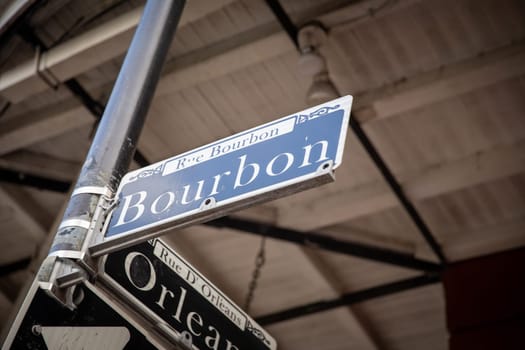 Street signs in New Orleans cross street