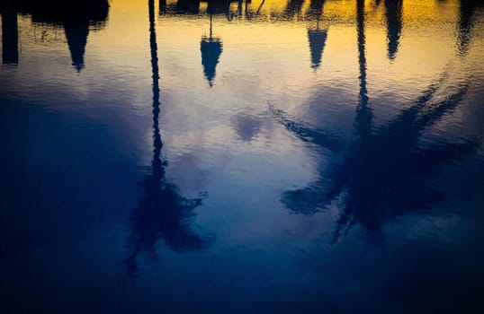 Sunrise Reflection on Resort Pool on still water