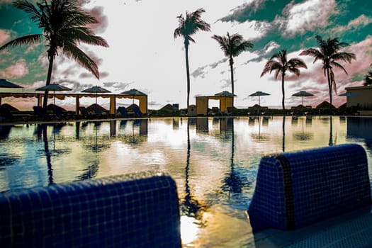 Infinity pool with jacuzzis in the morning light