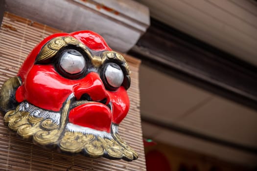Vietnamese mask on display with room for text