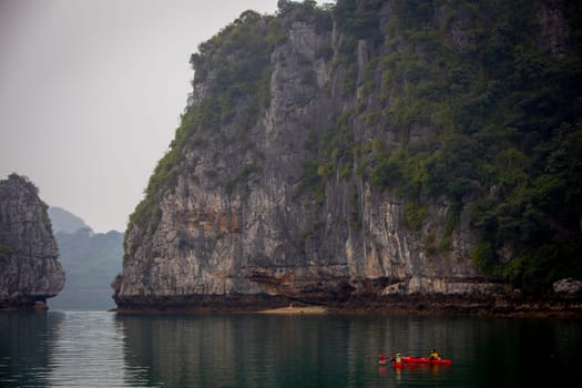 A pair of kayakers exploring in Halong Bay