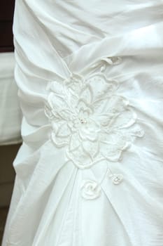 Wedding dress detail shown close up