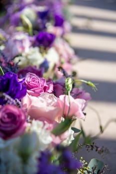 Wedding Aisle flowers attached to chairs