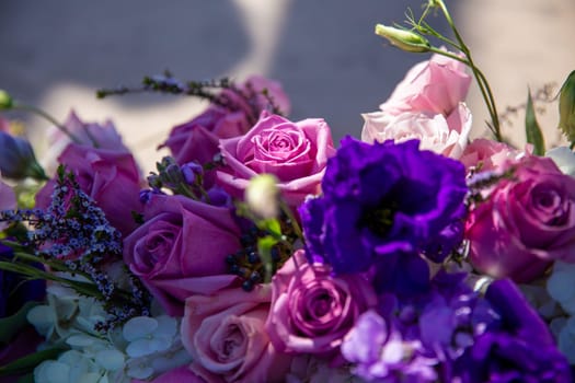 Pink Rose Highlighted in the middle of a floral arrangement