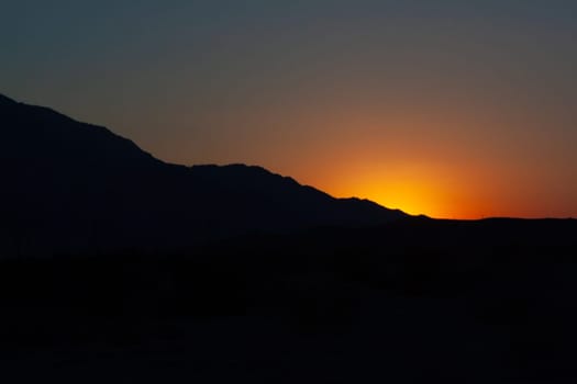 Sunset in the Desert with mountains