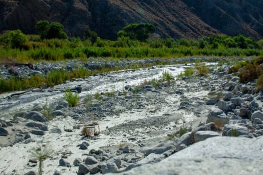 Flowing water going through the desert