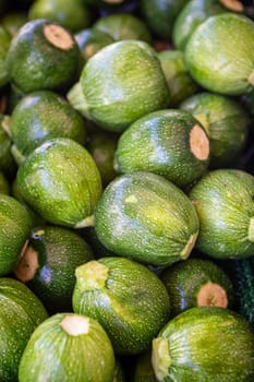 Bunch of Organic Dwarf Zucchinis at the market