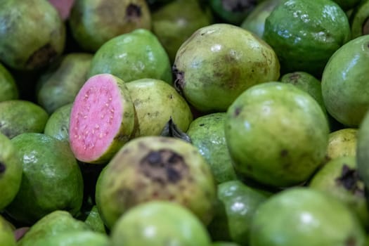 Ripe Pink Guavas with on opened to show ripeness