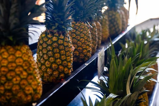 Row of Pineapples at a farmers market