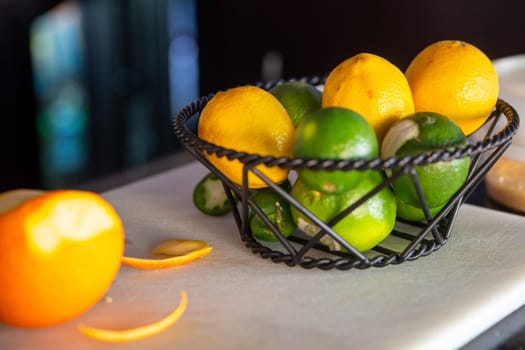 Lemons and Limes on a bar top for zest