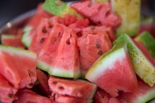 Bowl of sliced up fresh watermelon to serve