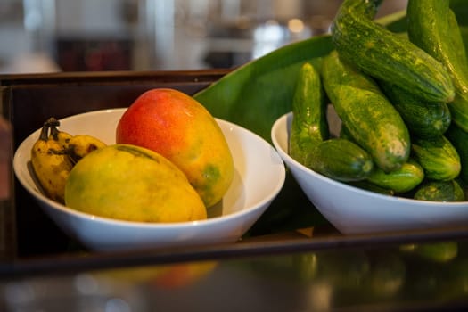 Fruits and Vegetables in bowls on display
