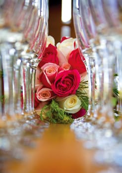 Wedding Flutes and rose bouquet framed artistically