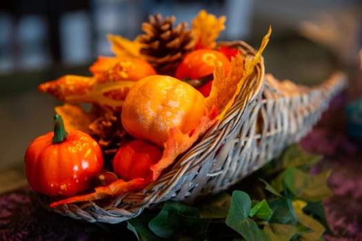 Cornucopia with Gourdes inside for thanksgiving decoration