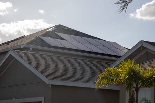 Home with Solar Panels attached to a roof