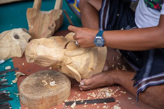 Carving Indonesian Decor to sell at a village