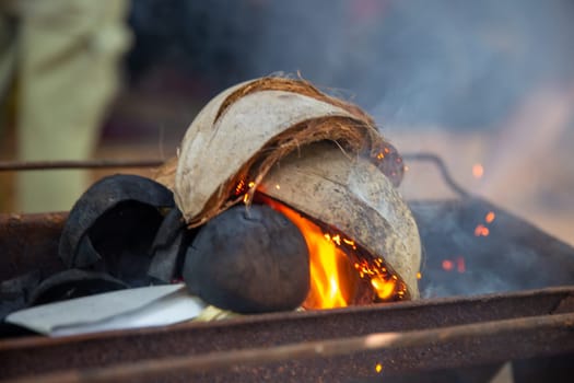 Heated Coconut Shells to use as fuel