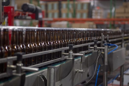 Bottles of empty beer in a production
