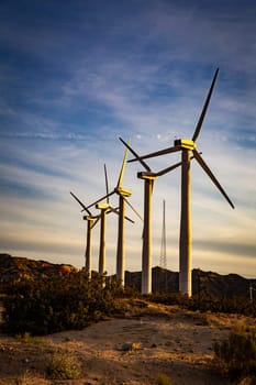 A group of wind turbines in the morning