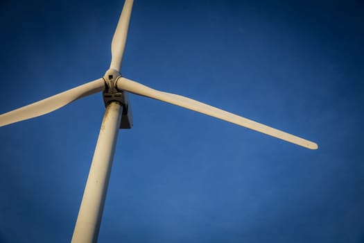 Single Wind Turbine on a clear blue sky