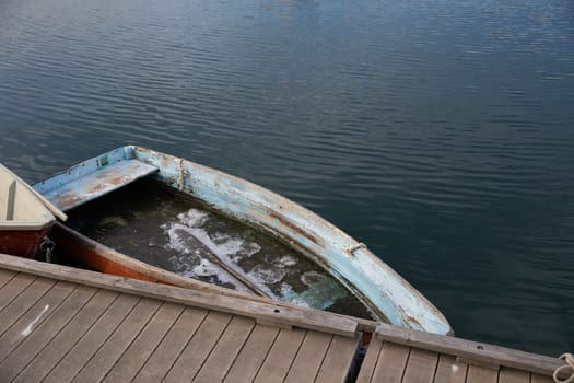 Abandoned Boat Sinking in the water