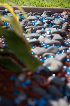 Garden Walkway with Blue rocks represting a stream