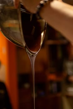 A Chocolatier Pouring Melted Chocolate