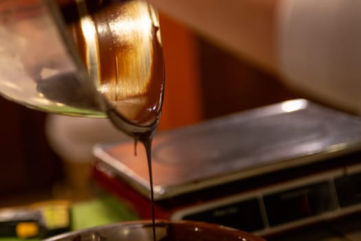 A Chocolatier Pouring Melted Chocolate