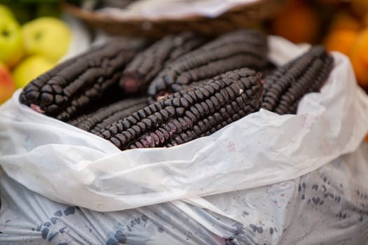 Bag of Fresh black corn at the market