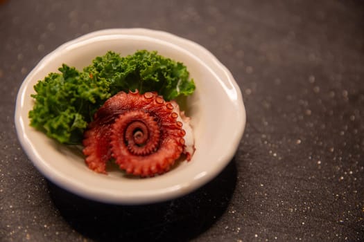 Octopus Sashimi Served in a ramekin