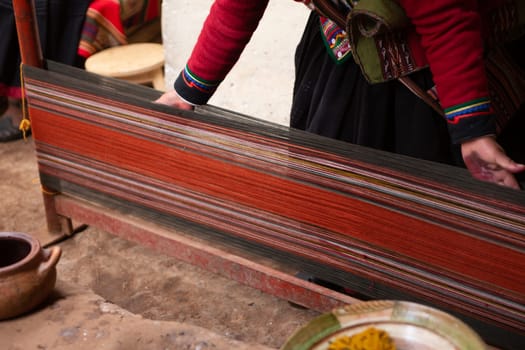 Peruvian Woman Weaving a scarf