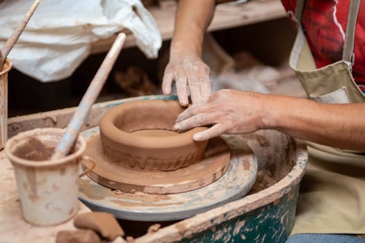 Artisan Crafting a ceramic bowl to be sold