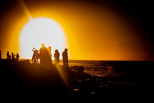 Tourists in La Jolla at Sunset taking photos