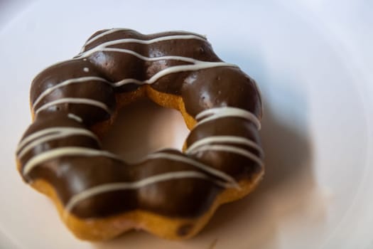 Chocolate Mochi Donut with vanilla drizzle