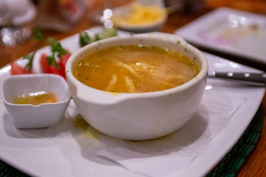 Peruvian Chicken Soup served on a plate