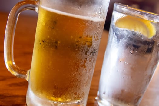 Light beer and water with condensation
