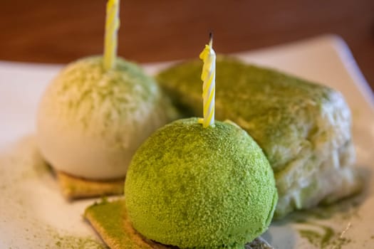 Matcha green tea ice cream served with cake