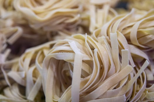 Whole pasta nests at a marketplace