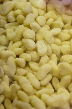 Raw gnocci pasta on sale at the market