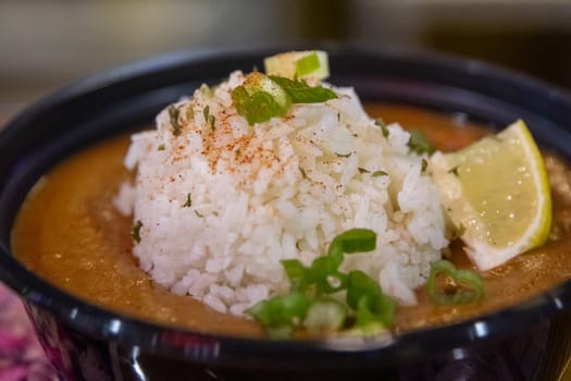 Seafood Etouffee with Lemon served at a mardi gras festival