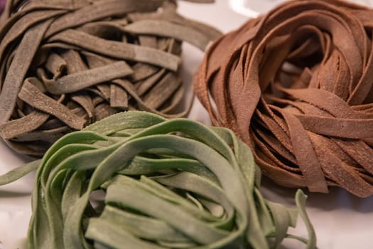 Three different pasta nests uncooked