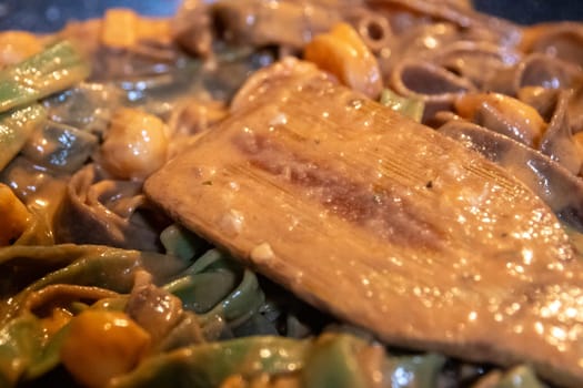 Scallop and Pasta with Vodka Sauce being mixed
